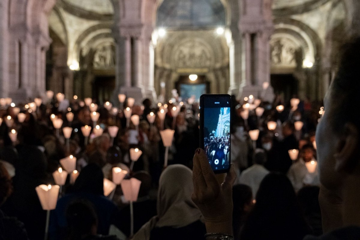 Veillée de prière pour la Journée mondiale du Migrant et du Réfugié. © Camille Rorive.