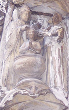 Saint Marcel donne le baptême. © C. D. A. S.